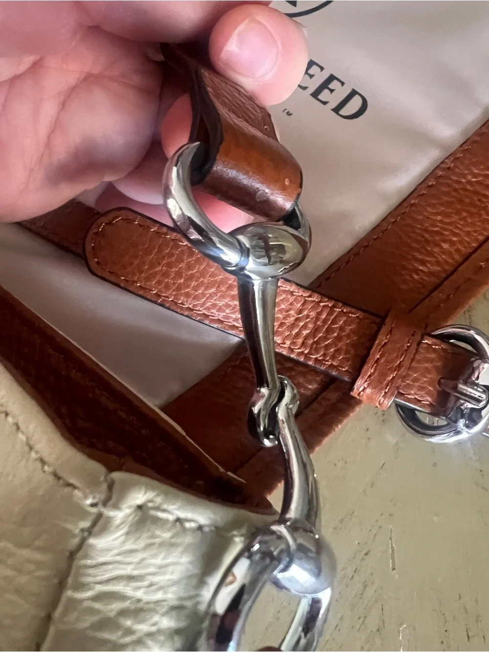 Tucker tweed. Tan and Cream Leather Crossbody Messenger Bag with Horse Medallion